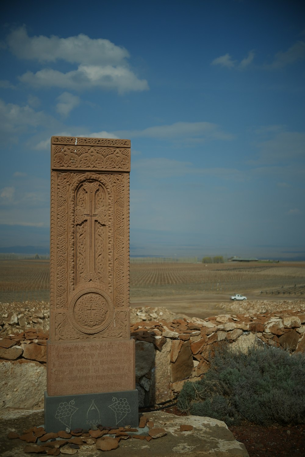 a monument in the middle of a field