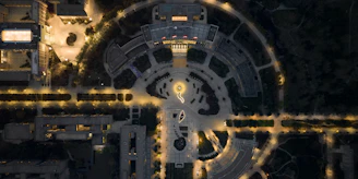 Evening view of a land development site with geometric layout and soft lighting.