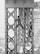 Two men are working high up on a steel structure, likely part of a large bridge or building framework. They are dressed in work clothes and appear to be engaged in construction or maintenance tasks. The background shows the intricate lattice of the structure, indicating an engineering feat.