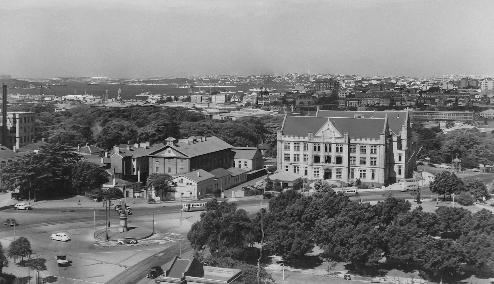 Black and white photograph of an Australian city viewed from above