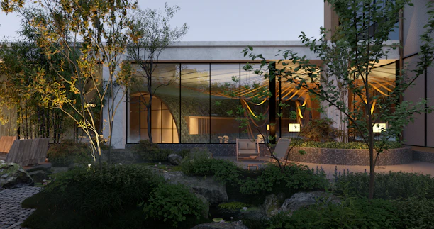 A sleek modern garden room with large glass doors opening to a lush backyard under soft evening light.