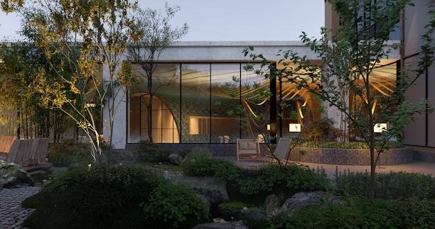 A modern architectural setting with large glass windows reflecting a softly lit interior. The foreground features a lush garden with various trees, shrubs, and rocks. There's a patio area with comfortable seating next to a small water feature, creating a serene outdoor living space.