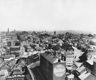 Historic black-and-white photo of the original Maqsood Flour & General Mill from 1985.