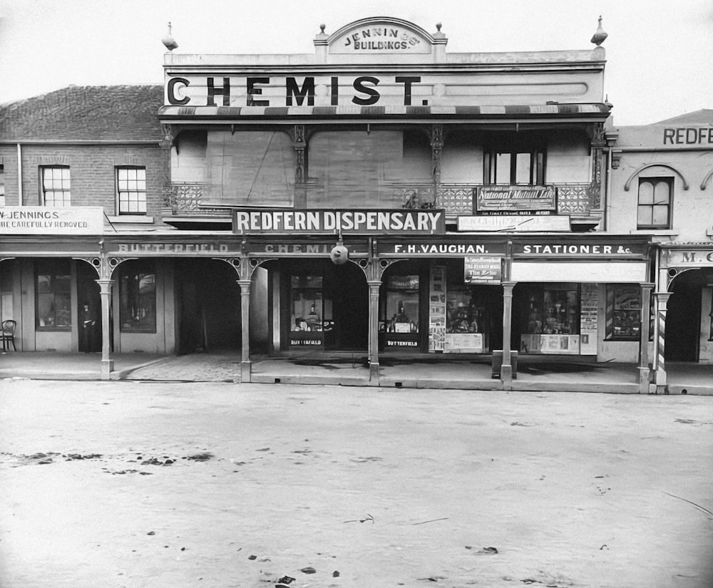 an old black and white photo of a building