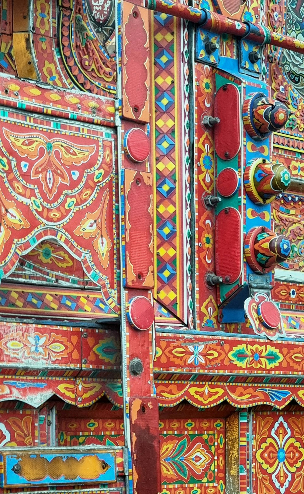 a close up of a colorful painted truck