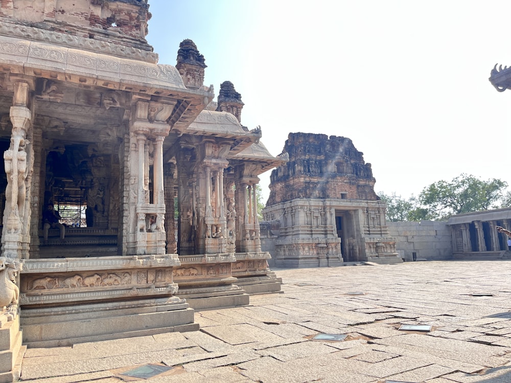 a stone building with pillars and pillars in front of it