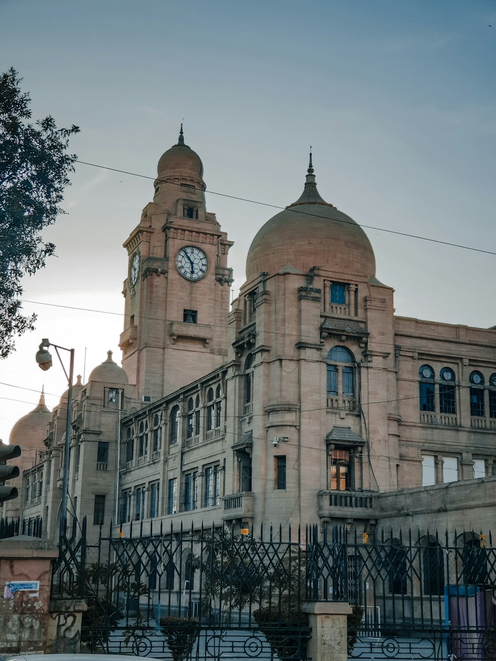 a large building with a clock on the top of it