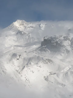 Snow-covered mountain landscape symbolizing preparation for ski season.