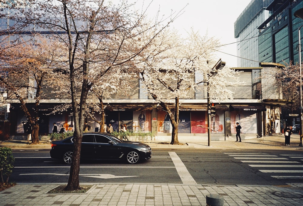 a car is parked in front of a building