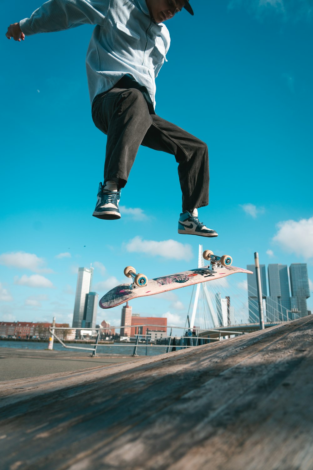 a man riding a skateboard up the side of a ramp