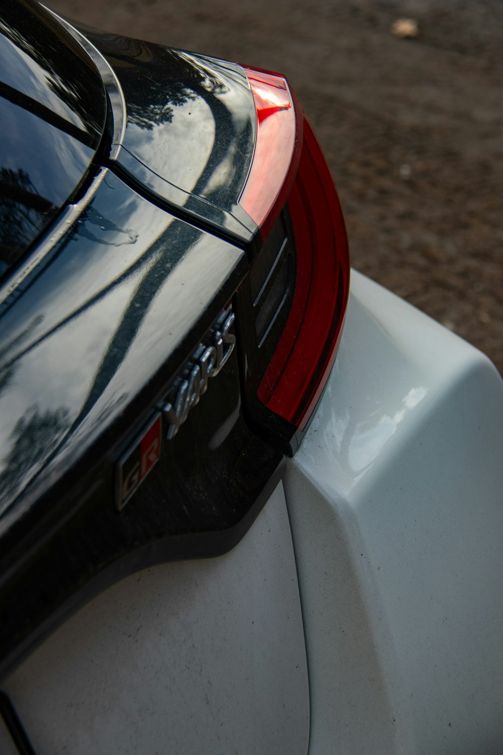 a close up of the tail light of a car