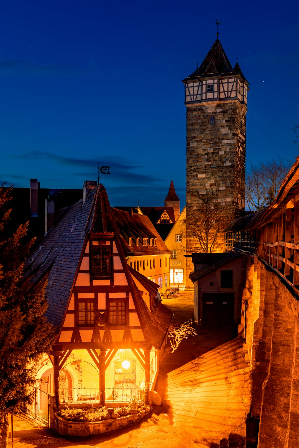 a building with a clock tower in the background