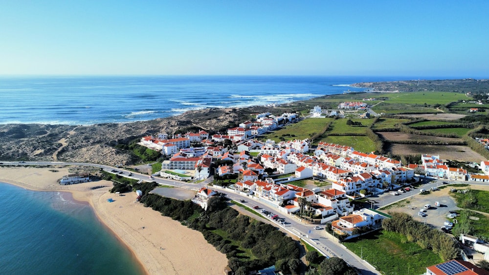 a bird's eye view of a small town by the ocean