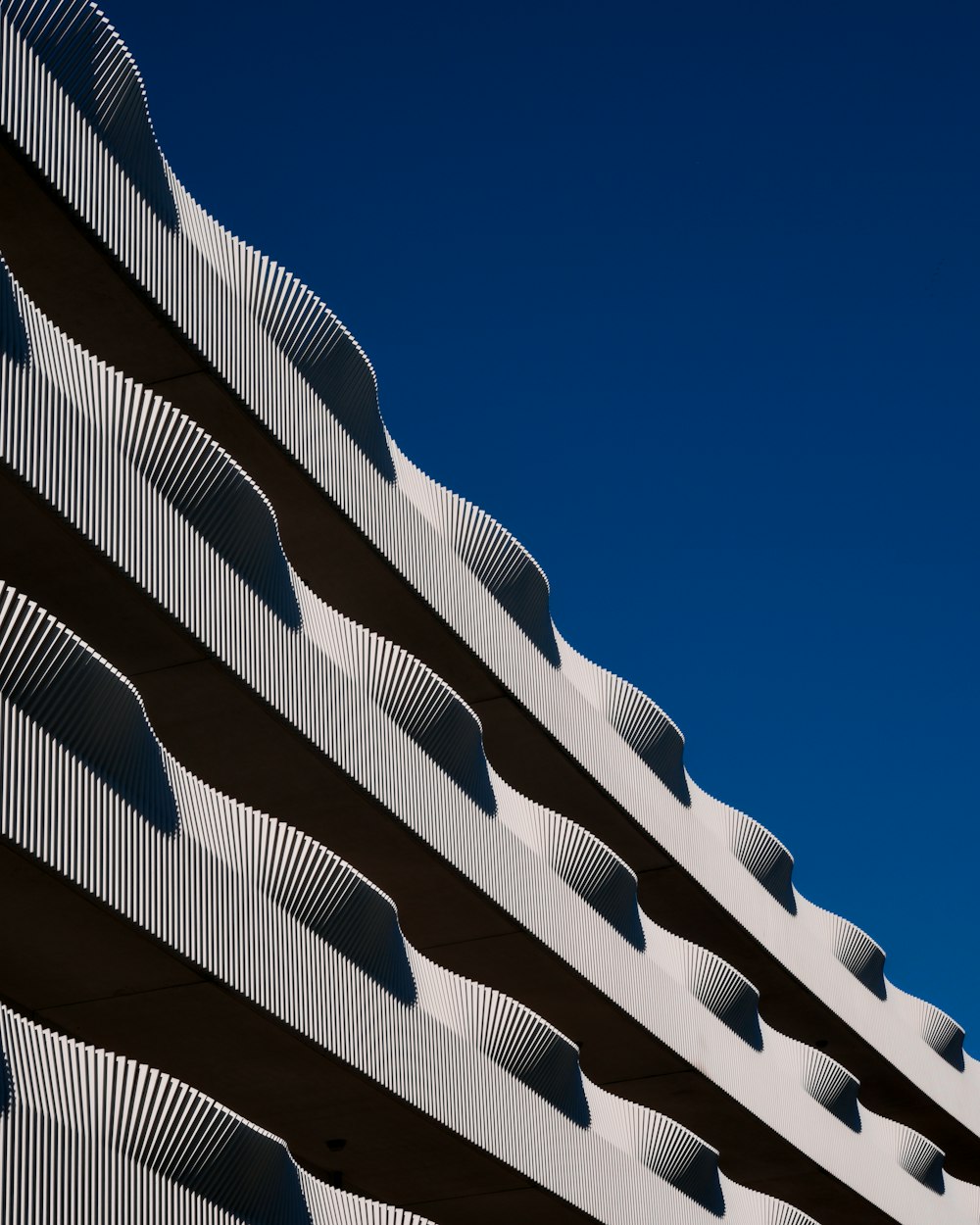 a close up of a building with a blue sky in the background