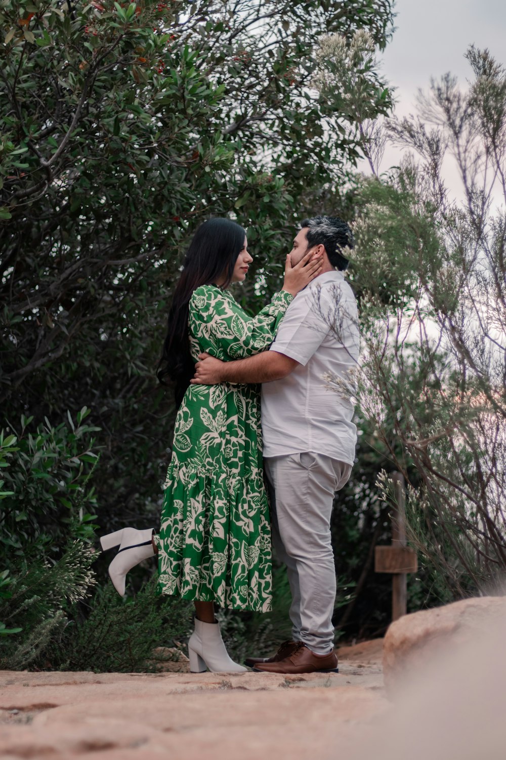 a man and a woman standing next to each other