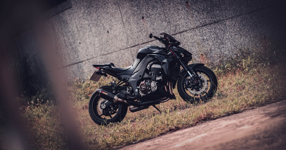 a motorcycle parked on the side of a road