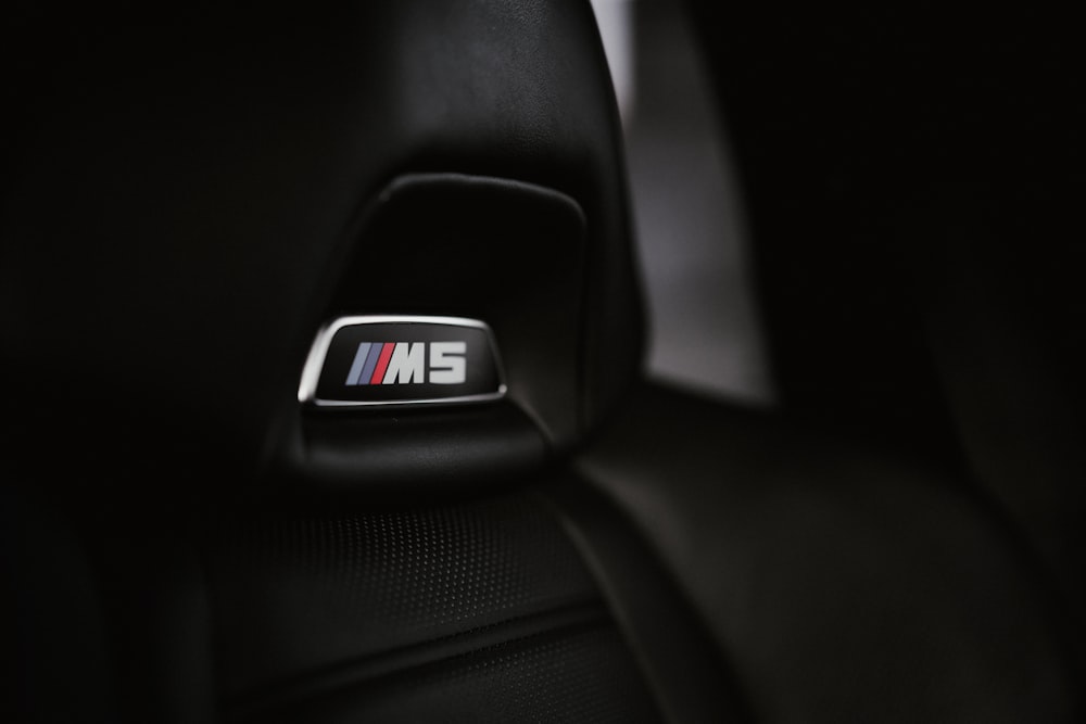 a bmw emblem is shown on the front seat of a car