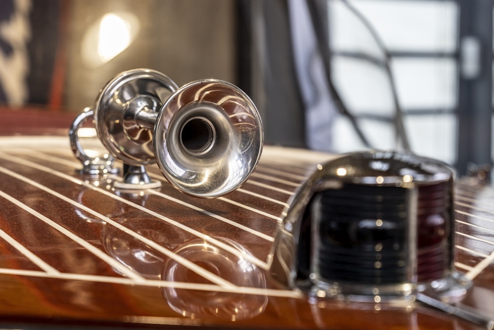 a close up of a musical instrument on a table