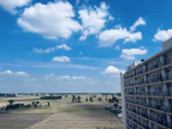 A scenic view of Royse City’s open fields under a bright blue sky.