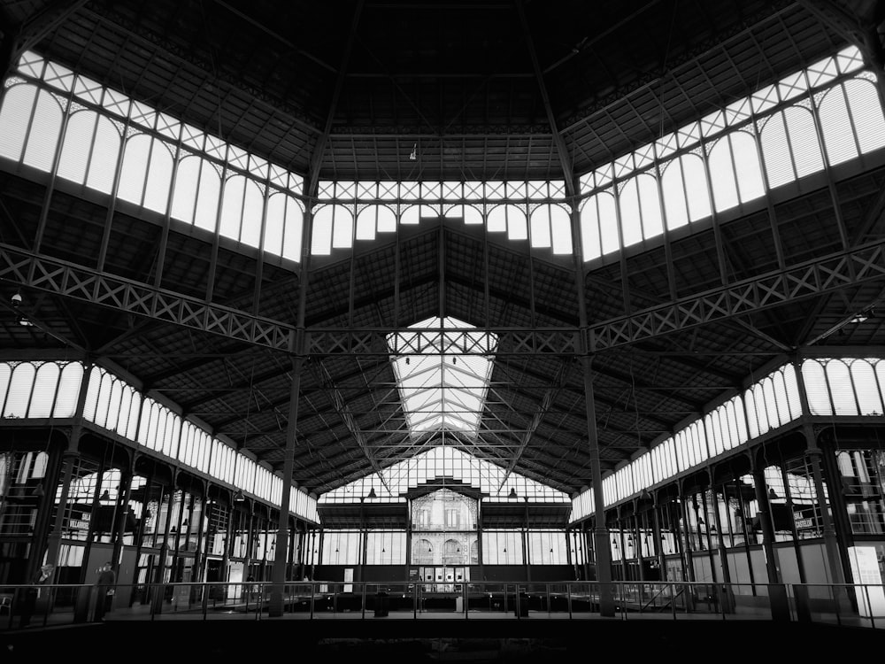 a black and white photo of a train station