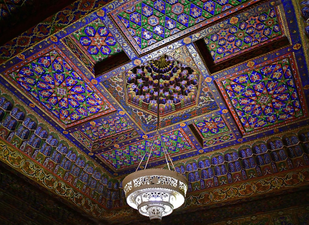 a chandelier hanging from the ceiling of a building