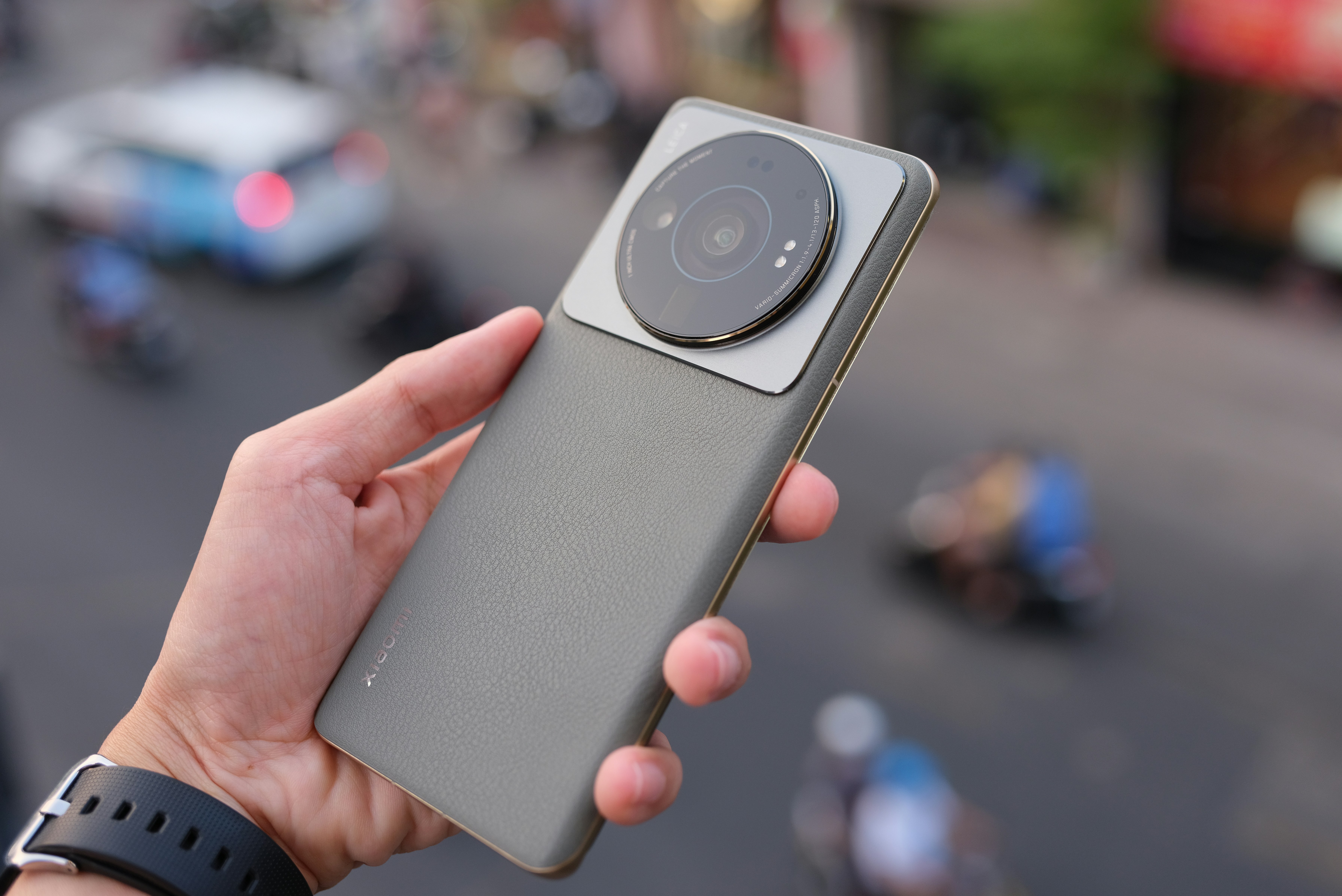 a person holding a camera in their hand