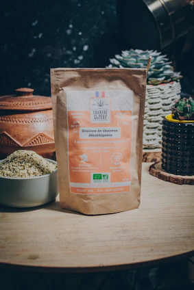 Close-up of a hemp product container featuring a farm bill compliance certification label.