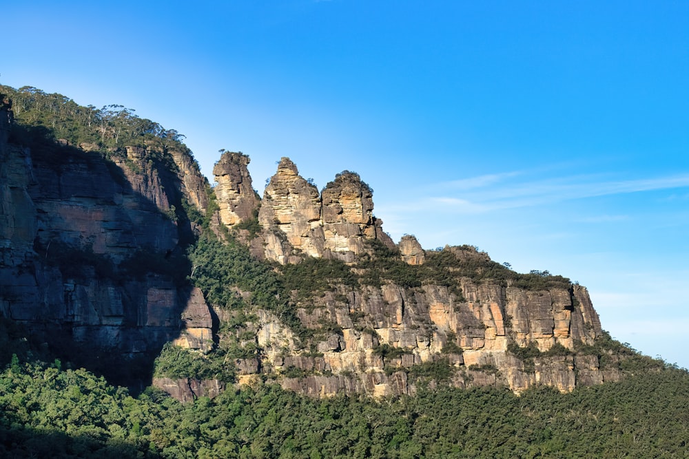 a group of rocks on the side of a mountain