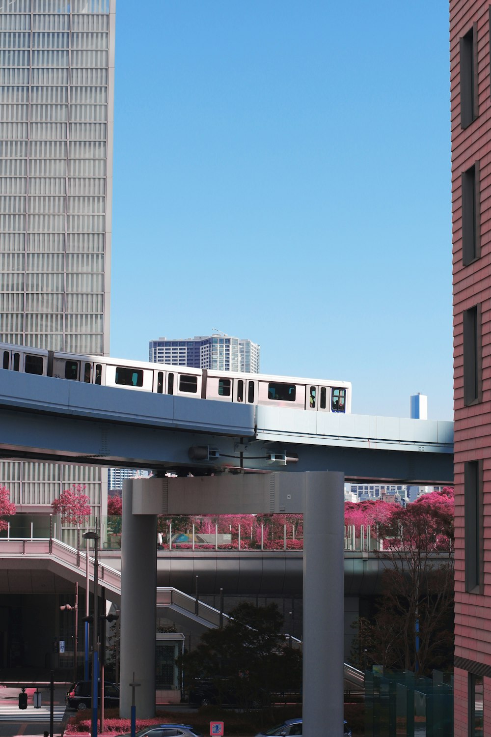 a train on a track going over a bridge