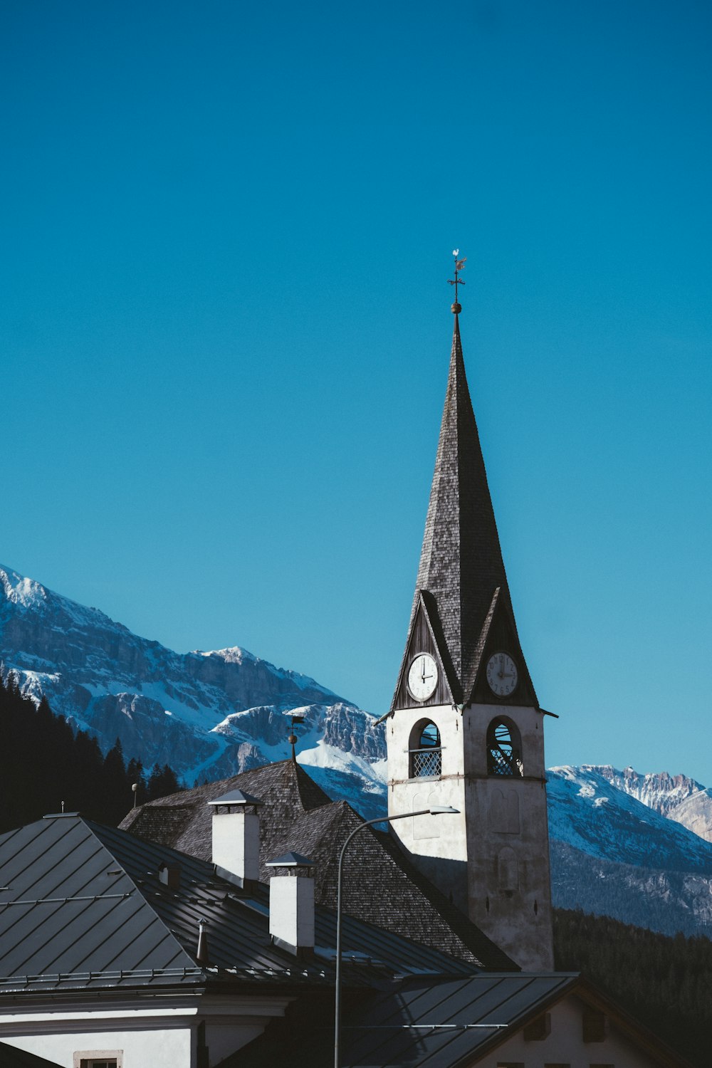 a church with a steeple and a clock tower