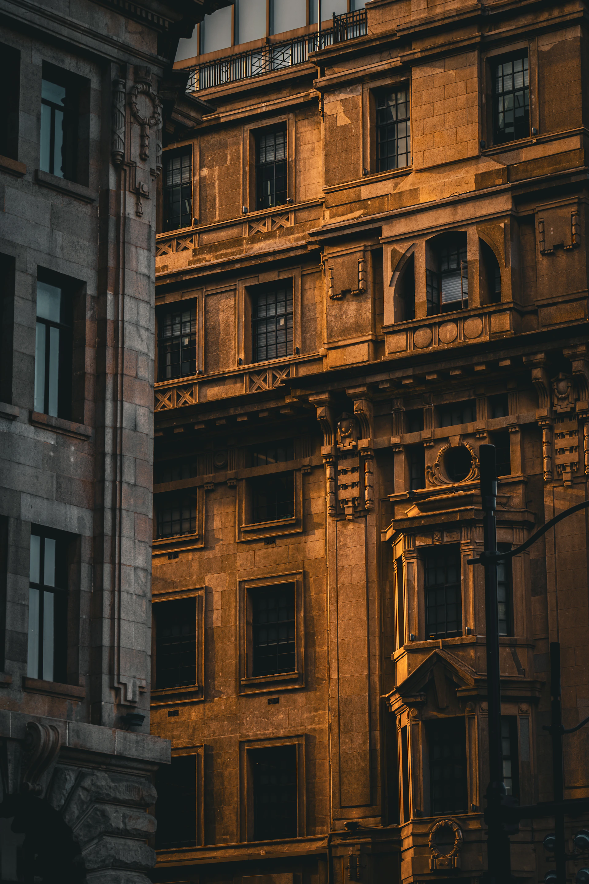 A warm, inviting shot of the Whitley Bay Masonic Hall's elegant exterior at sunset, with soft golden light highlighting its classic architecture.