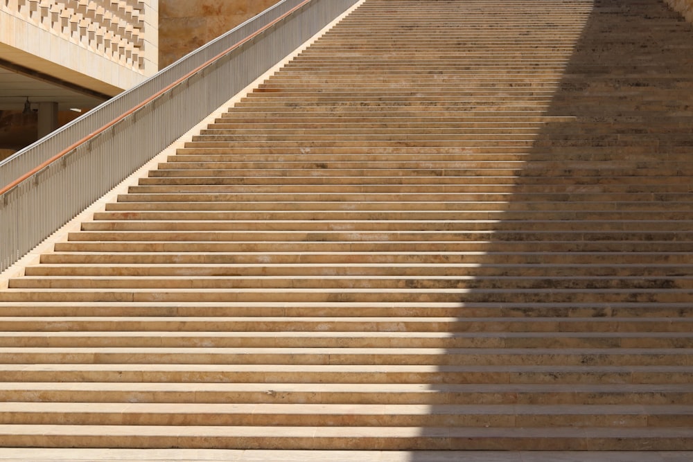 a man riding a skateboard down a set of stairs