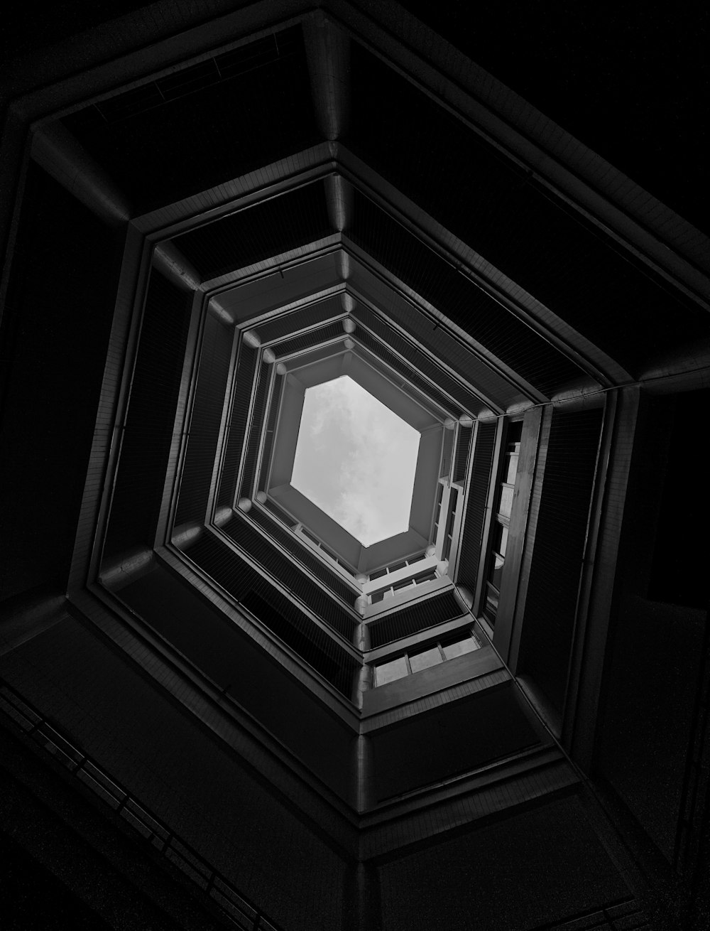 a black and white photo of a ceiling