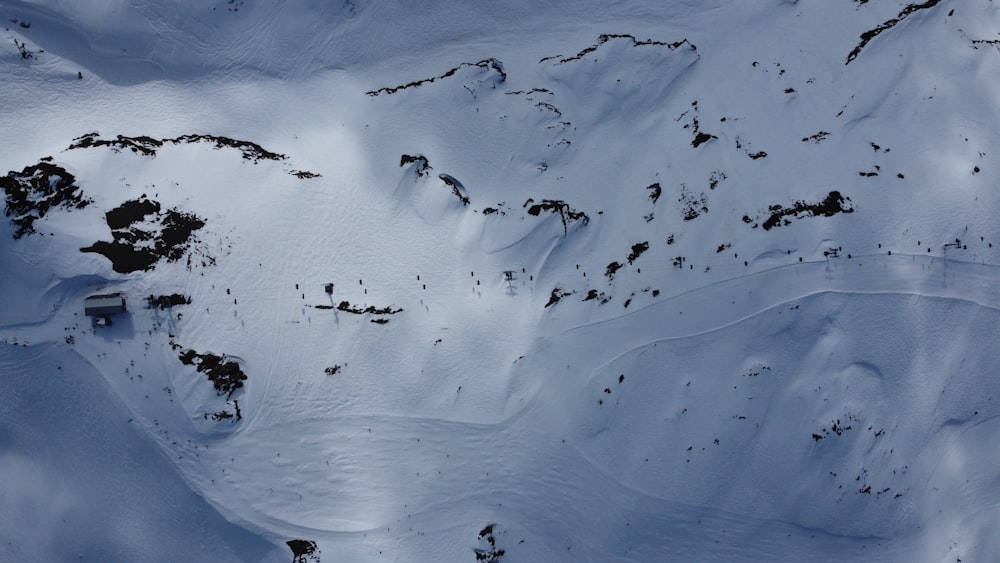 a mountain covered in snow with lots of snow on it