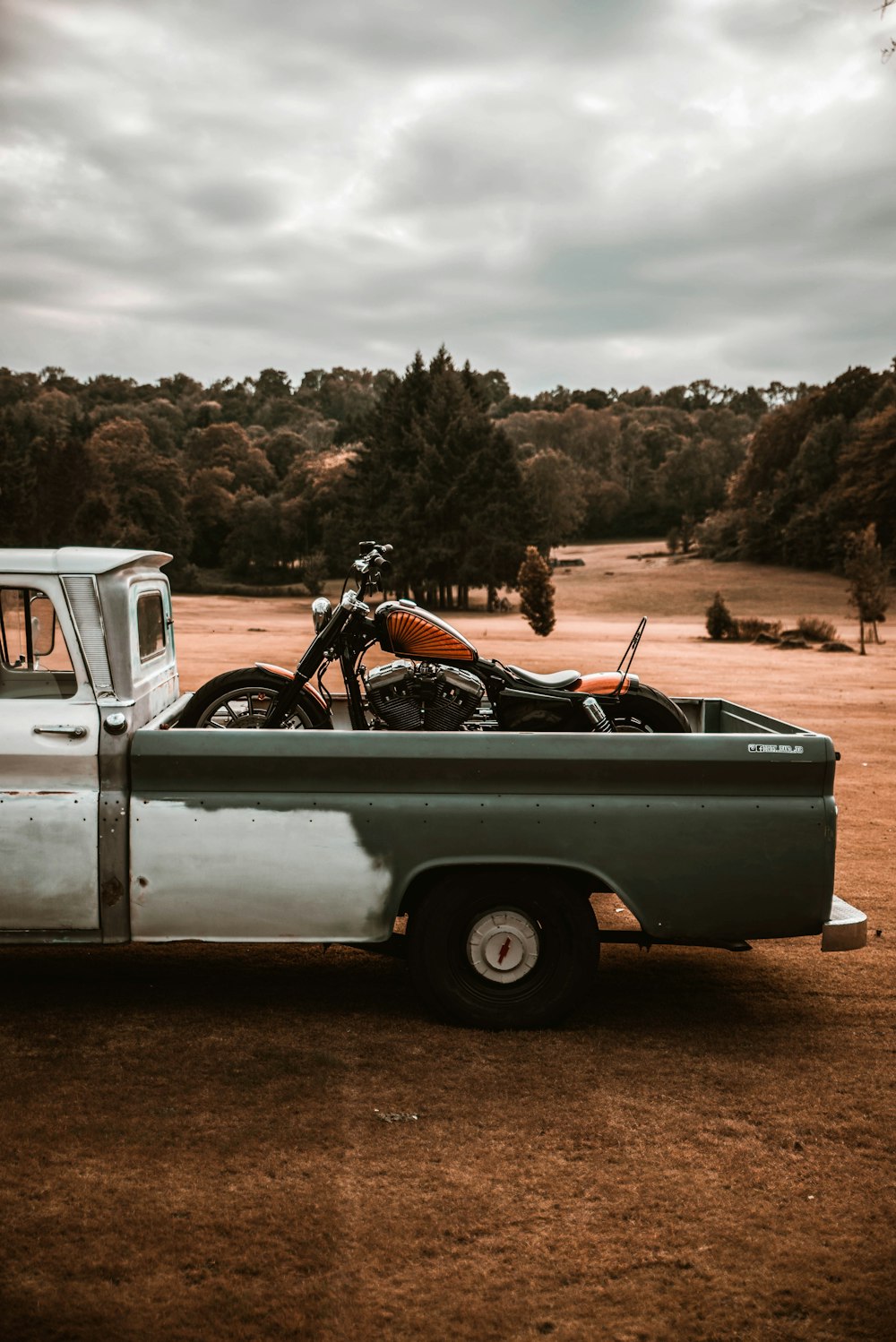 a motorcycle in the back of a pick up truck