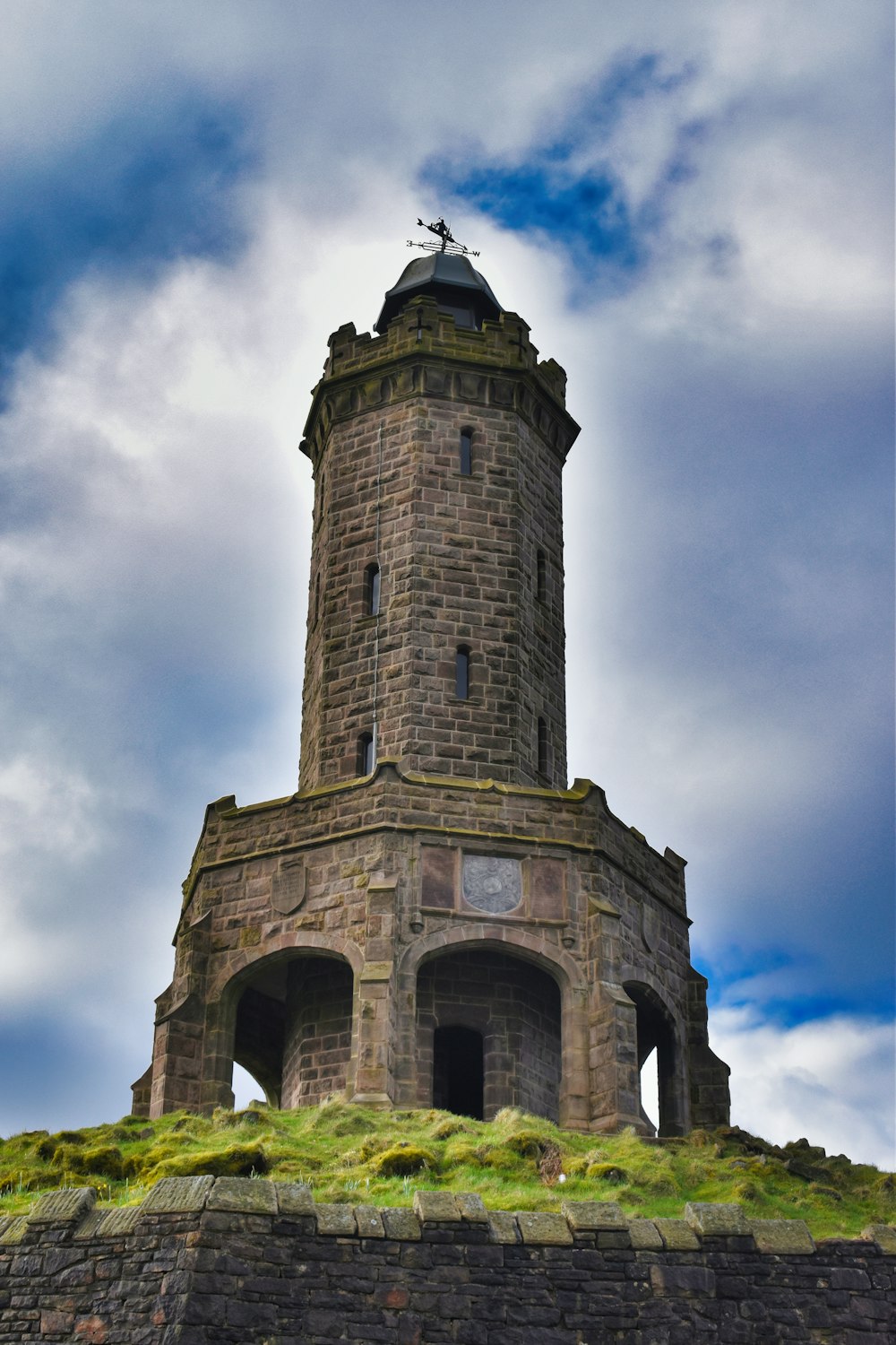 a tall tower with a clock on top of it