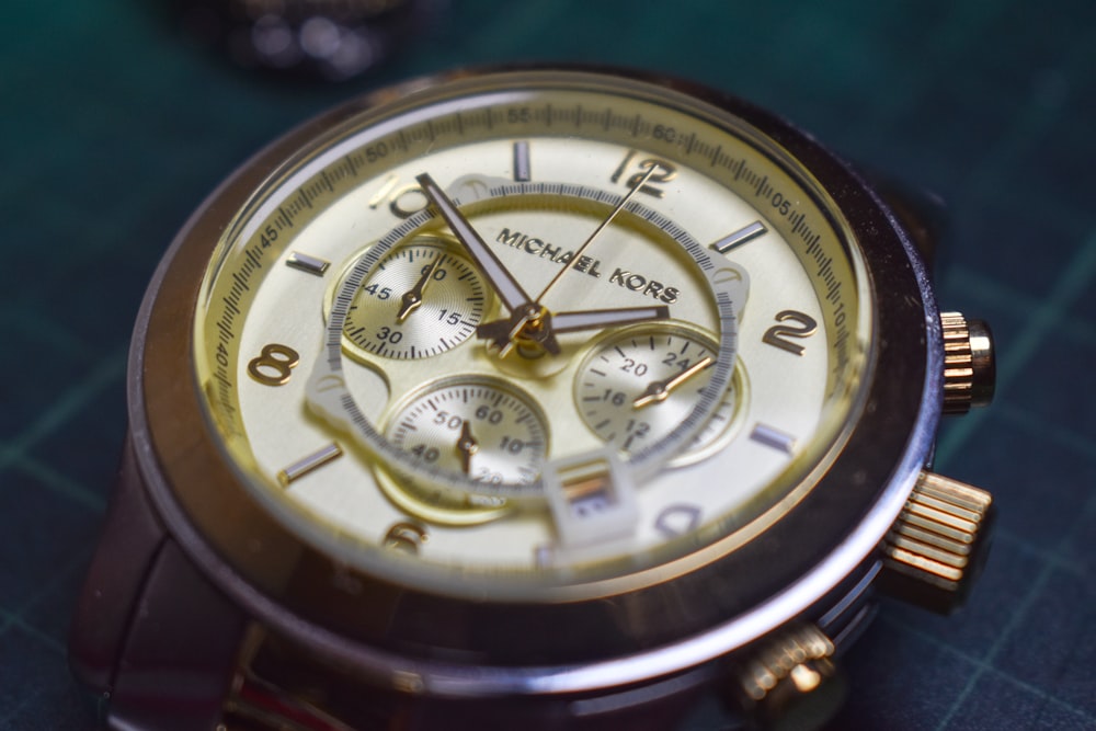 a close up of a watch on a table