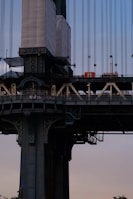 Close-up of a bridge support structure highlighting detailed engineering work.