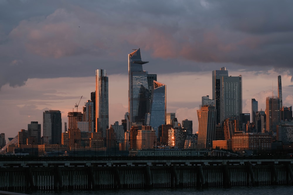 a view of a city skyline at sunset