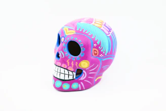 Vibrant, hand-painted skulls showcasing intricate Mexican folk art details.