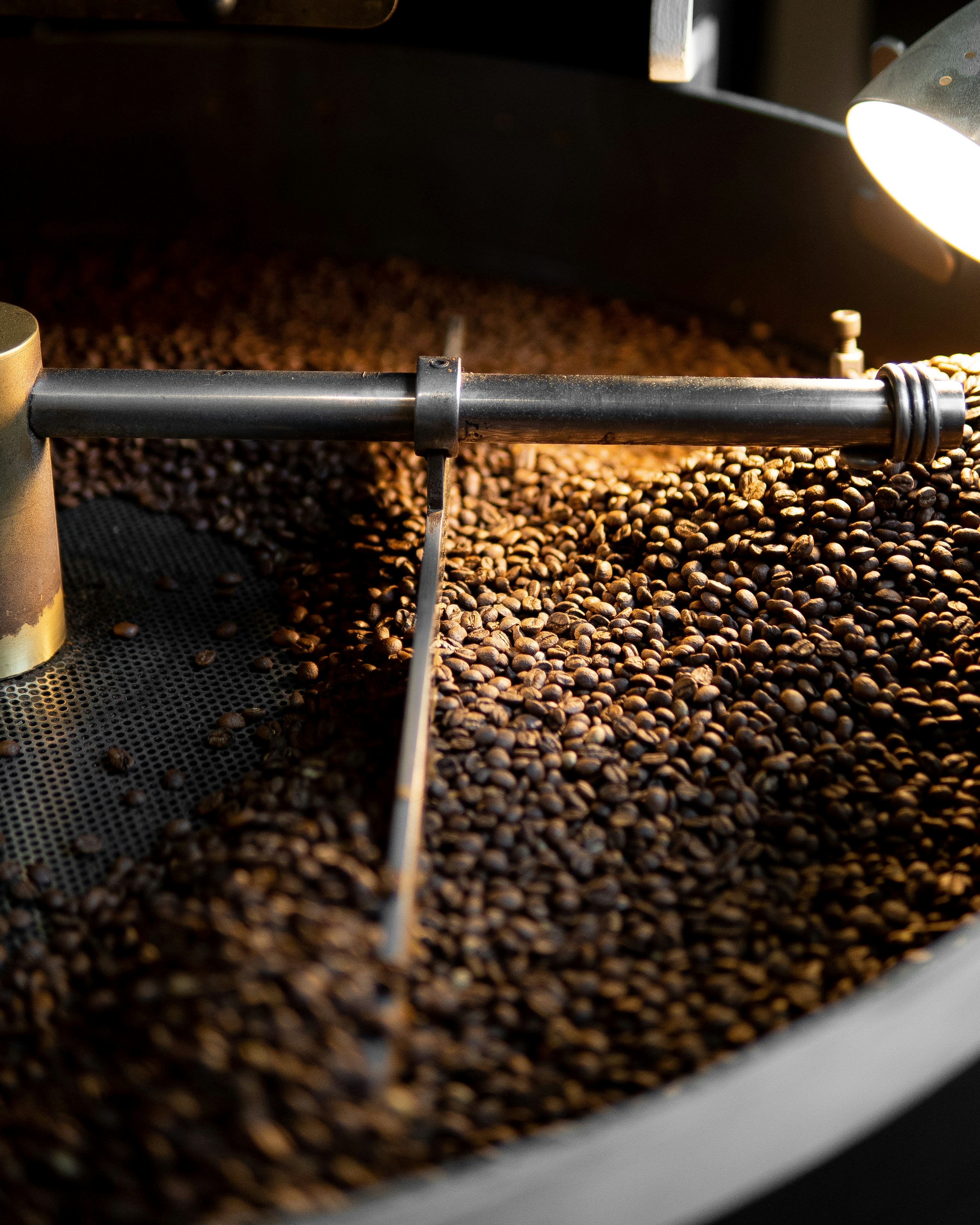 a machine that is making coffee beans