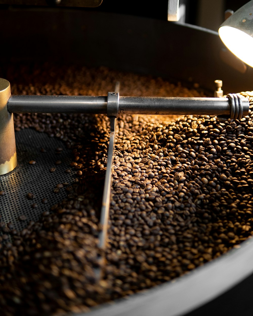 a machine that is making coffee beans