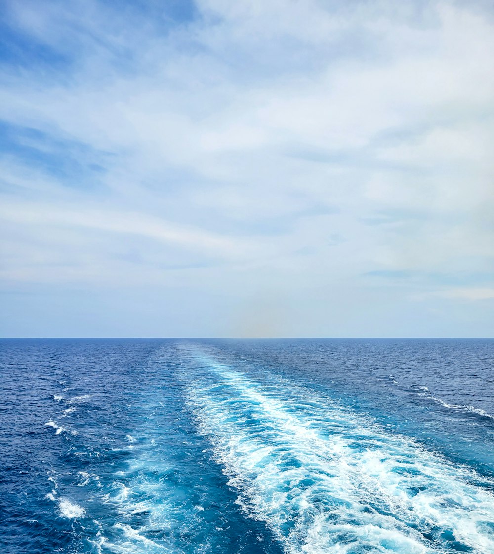 the wake of a boat in the open ocean