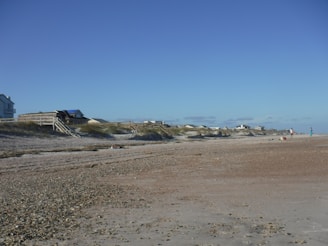 The sandy beach just steps away from the Torre Lapillo house entrance.