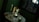 A dimly lit room with a small round table draped with a lace tablecloth. On the table, there is an antique hourglass, tarot cards, a burning candle, and a stack of cards. A window behind reveals a night sky with a full moon and tree silhouettes.