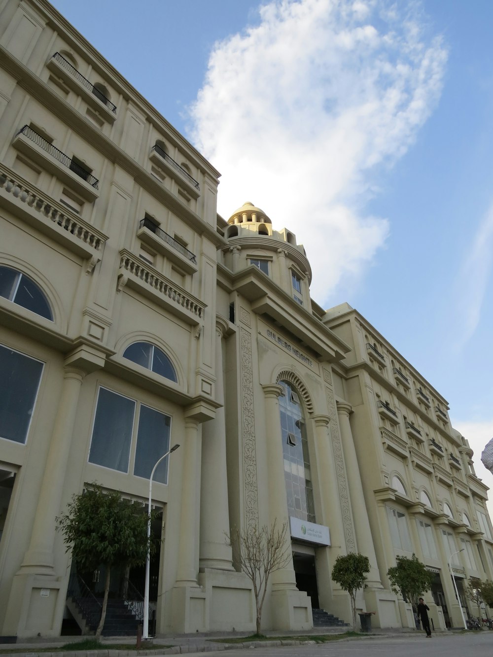 a large building with a clock on the top of it