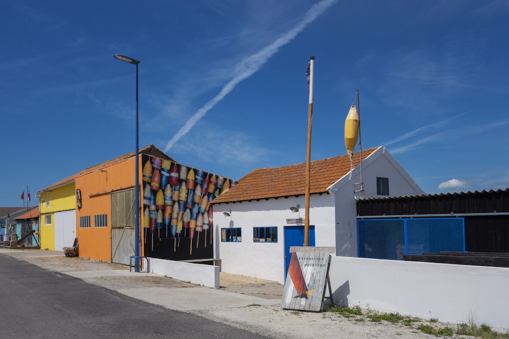 a row of buildings with a blue sky in the background