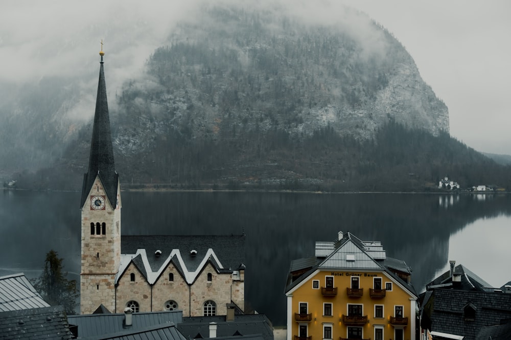 a view of a town with a mountain in the background