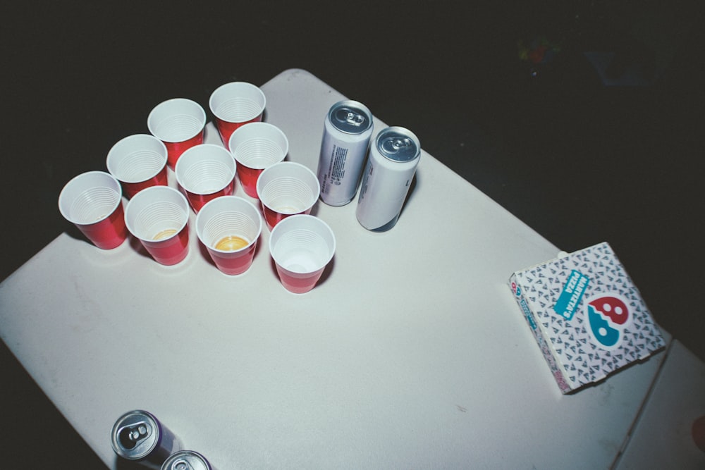 a table topped with lots of empty cups