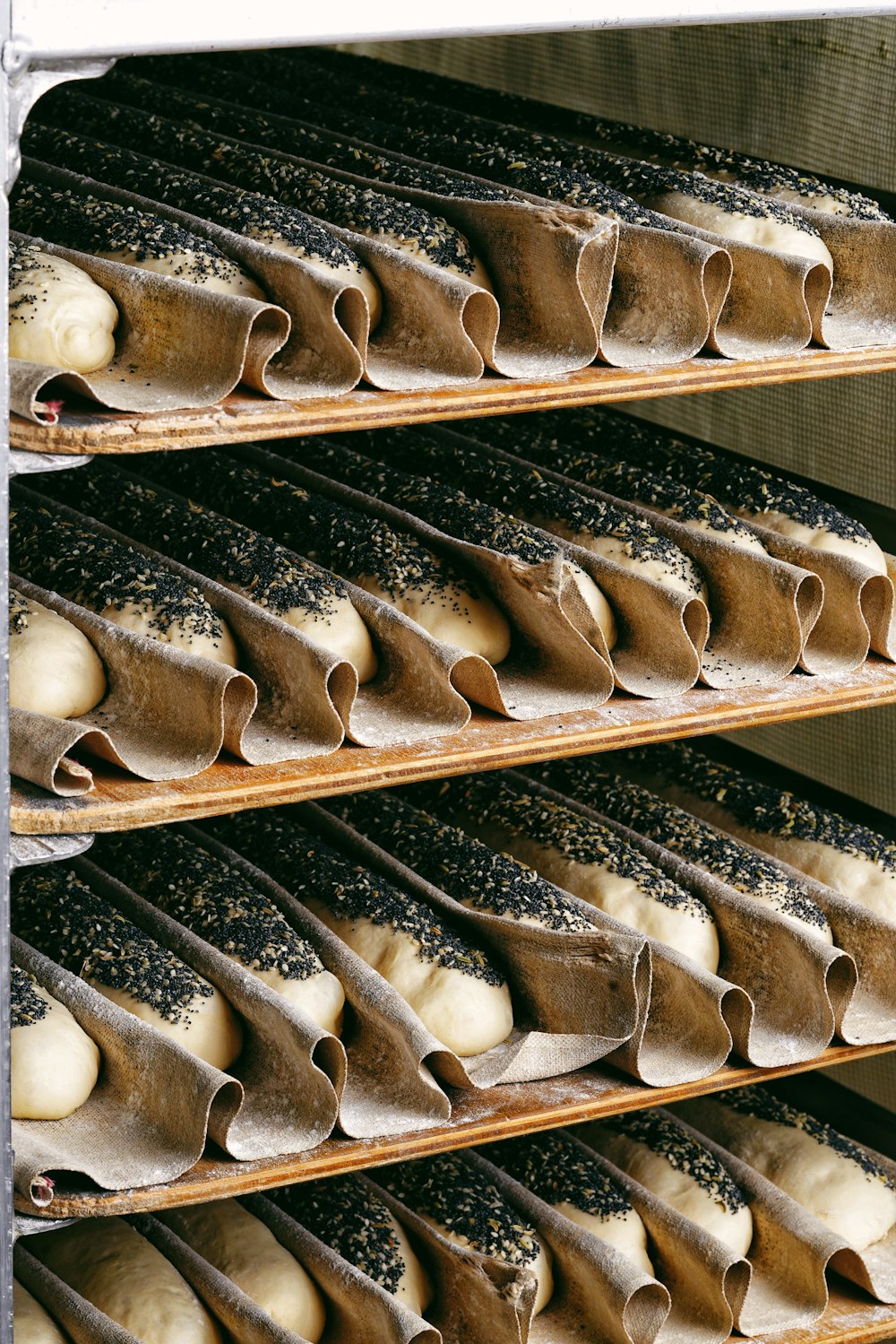 a bunch of doughnuts that are on a rack